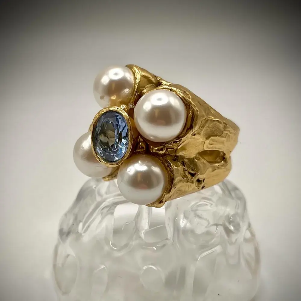Bubbles II, Bronzo, perle e topazio azzurro